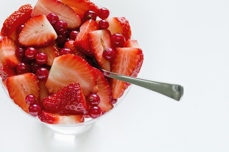 Photograph of a bowl of red fruits saladの写真素材