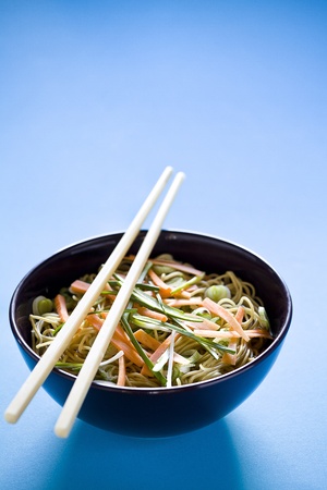 Photograph of a bowl of noodles with vegetablesの写真素材
