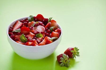 Photograph of a bowl of red fruits saladの写真素材