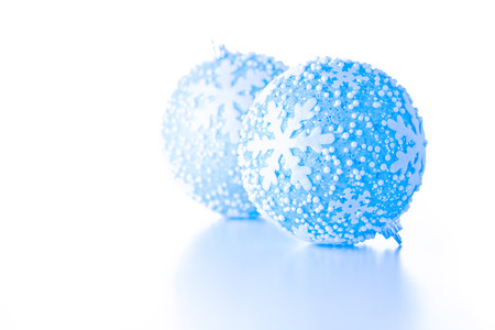 Close up photograph of some blue christmas ballsの写真素材