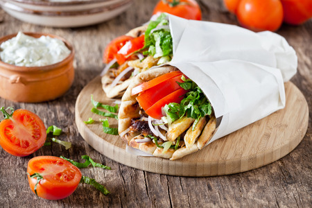 Couple of greek pork gyros with some tzatzikiの写真素材