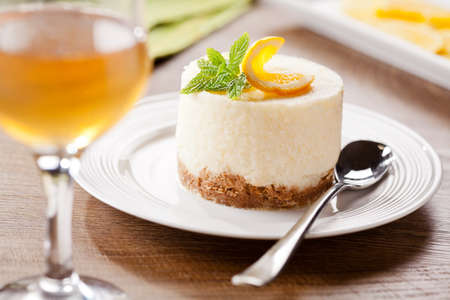 Homemade cheesecake with organic slices of orangesの写真素材
