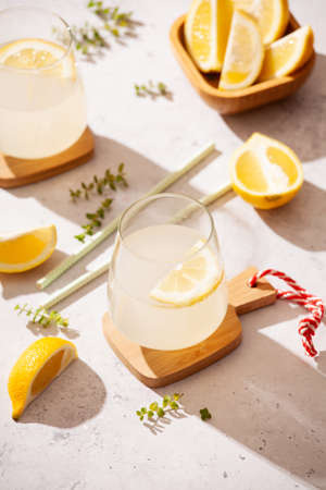 Couple Of Glasses Of Homemade Refreshing Lemonade With Organic Lemonsの写真素材