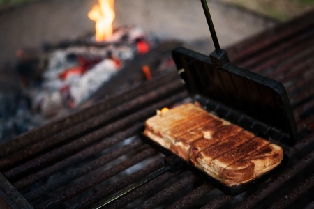 Closeup of a grilled sandwich done の写真素材