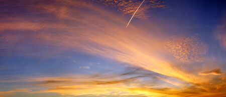 Stunning sunset clouds panorama in high resolutionの写真素材