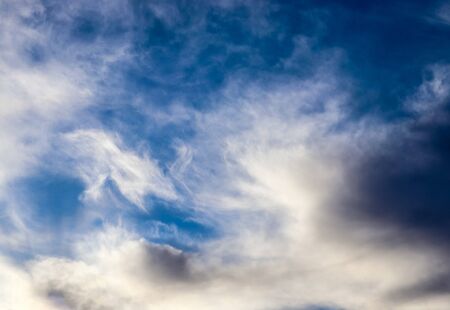 Beautiful white and fine cirrus clouds in a deep blue summer sky