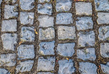 Detailed close up view on cobblestone textures in different perspectivesの写真素材