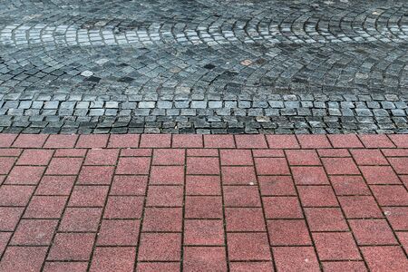 Detailed close up on old cobblestone roads in urban areas and old townsの写真素材