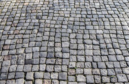 Detailed close up view on cobblestone street textures in high resolutionの写真素材