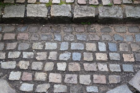 Detailed close up view on cobblestone street textures in high resolutionの写真素材