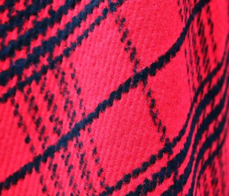 Close up view on colorful hanging and folded fabric textures and textiles in high resolution found on a fabrics marketの写真素材