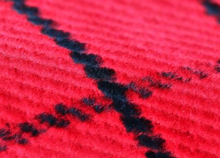 Close up view on colorful hanging and folded fabric textures and textiles in high resolution found...