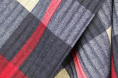 Close up view on colorful hanging and folded fabric textures and textiles in high resolution found...