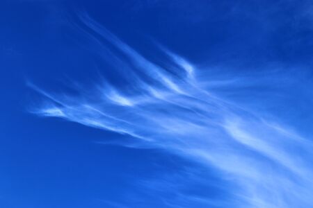 Beautiful panorama of white cloud formations in a blue sky
