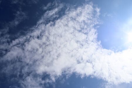 Beautiful cirrus cloud formations in a deep blue sky