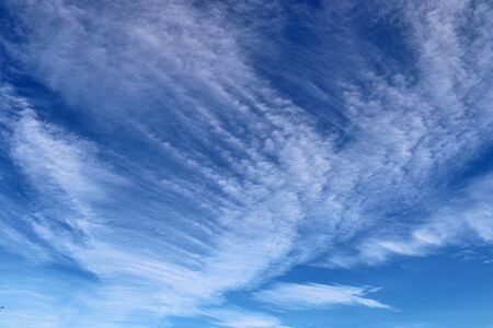 Beautiful white and fine clouds in a deep blue summer sky
