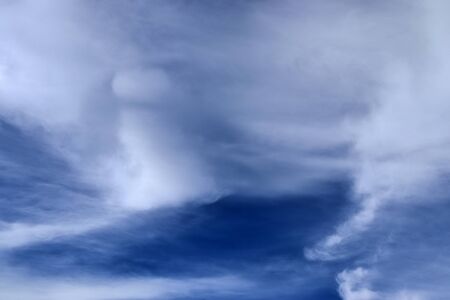 Beautiful white and fine clouds in a deep blue summer sky