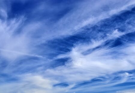 Beautiful white and fine clouds in a deep blue summer sky