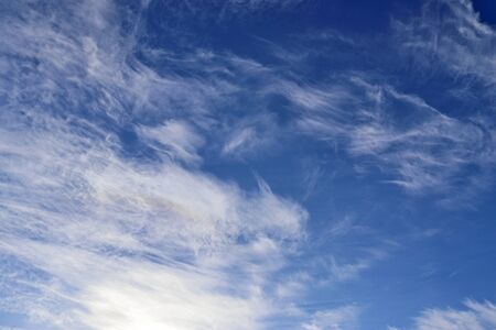 Beautiful white and fine clouds in a deep blue summer sky