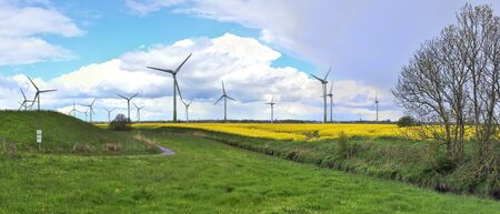 Detailed panorama of wind energy parks in northern germany close to the north sea