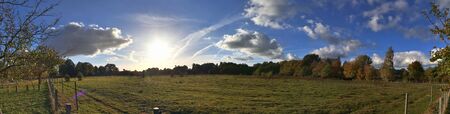 High resolution panorama view on green landscapes with a blue sky found in northern germany