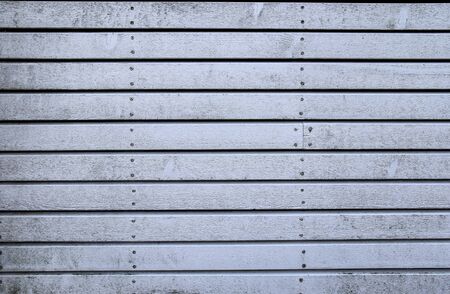 Detailed close up on wooden planks and weathered wood texturesの写真素材