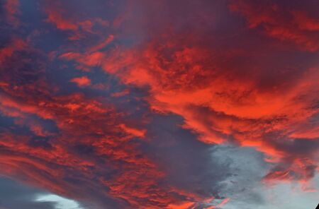 Deep red and orange clouds in a beautiful sunset