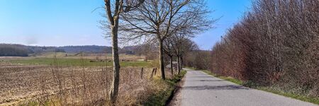 Beautiful panorama of a northern european country landscape with fields and green grass