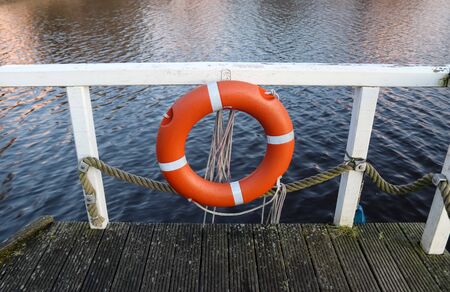 Beautiful sunset landscape at a small lake in northern Europe.の写真素材