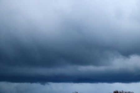 Stunning dark cloud formations in the sky right before a thunderstorm 