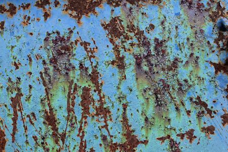 Detailed close up surface of rusty metal and steel with lots of corrosion in high resolution.