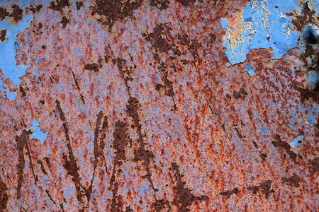 Detailed close up surface of rusty metal and steel with lots of corrosion in high resolution.