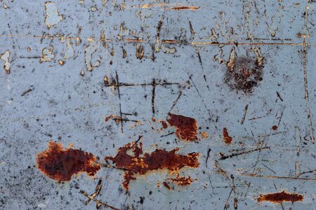 Detailed close up surface of rusty metal and steel with lots of corrosion in high resolution.