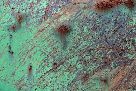 Detailed close up surface of rusty metal and steel with lots of corrosion in high resolution.の写真素材
