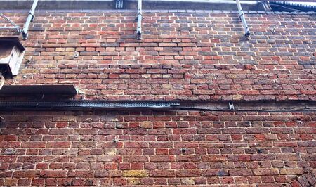 Old brick wall. Texture of old weathered brick wall panoramic background.