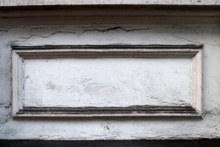 Detailed view on aged concrete walls fronm different modern and hostorical buildings with cracks and...