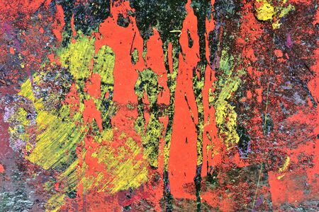 Colorful graffiti paint splashes on the wall and ground at a lost place ruin in Kiel northern...