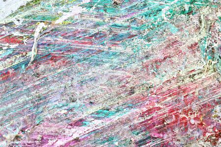 Colorful graffiti paint splashes on the wall and ground at a lost place ruin in Kiel northern germanyの写真素材