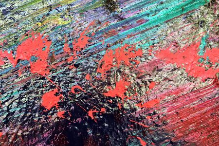 Colorful graffiti paint splashes on the wall and ground at a lost place ruin in Kiel northern germanyの写真素材