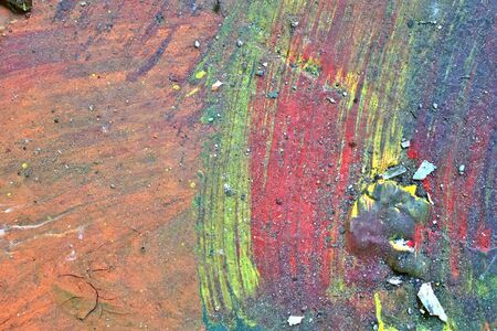 Colorful graffiti paint splashes on the wall and ground at a lost place ruin in Kiel northern germanyの写真素材