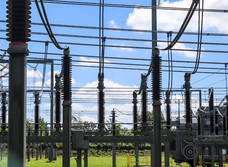 Electrical Transformer. Distribution of electric energy at a big substation with lots power lines