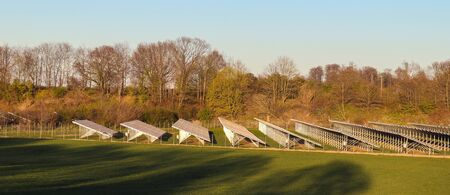 Generating clean energy with solar modules in a big park in northern Europe.