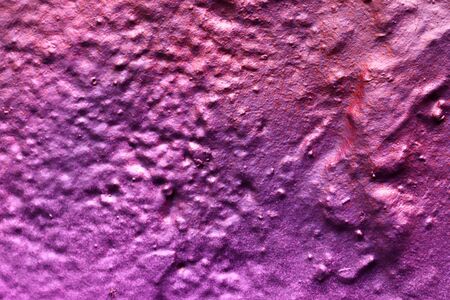 High resolution texture of colorful graffiti paint on conrete and brick walls in red blue purple and silverの写真素材