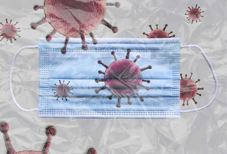 Medical corona virus mask behind plastic film with corona virus on and around it