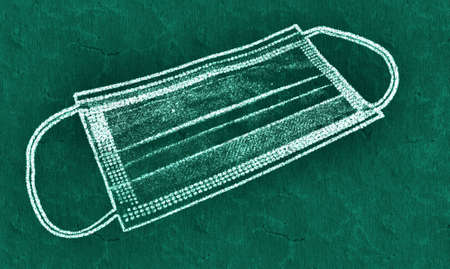 3D-Illustration of a chalk blackboard in school showing a medical virus mask for corona protection