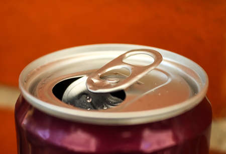 Top view up a can of soft drink isolated on wooden background