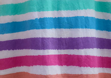 Detailed close up view on samples of cloth and fabrics in different colors found at a fabrics...