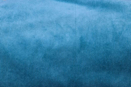 Detailed close up view on samples of cloth and fabrics in different colors found at a fabrics market.の写真素材