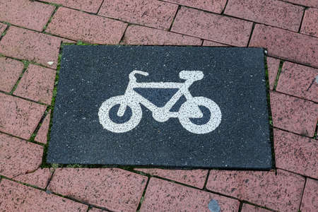 Painted bicycle signs on asphalt found in the streets of Germany