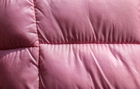 Detailed close up view on samples of cloth and fabrics in different colors found at a fabrics...